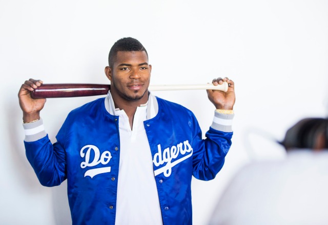 Behind the scenes with Yasiel Puig during his Starter photo shoot. (Photo by Colin Young-Wolff/Invision for Iconix/AP Images)